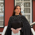 Midnight Sunburst Cape Gown