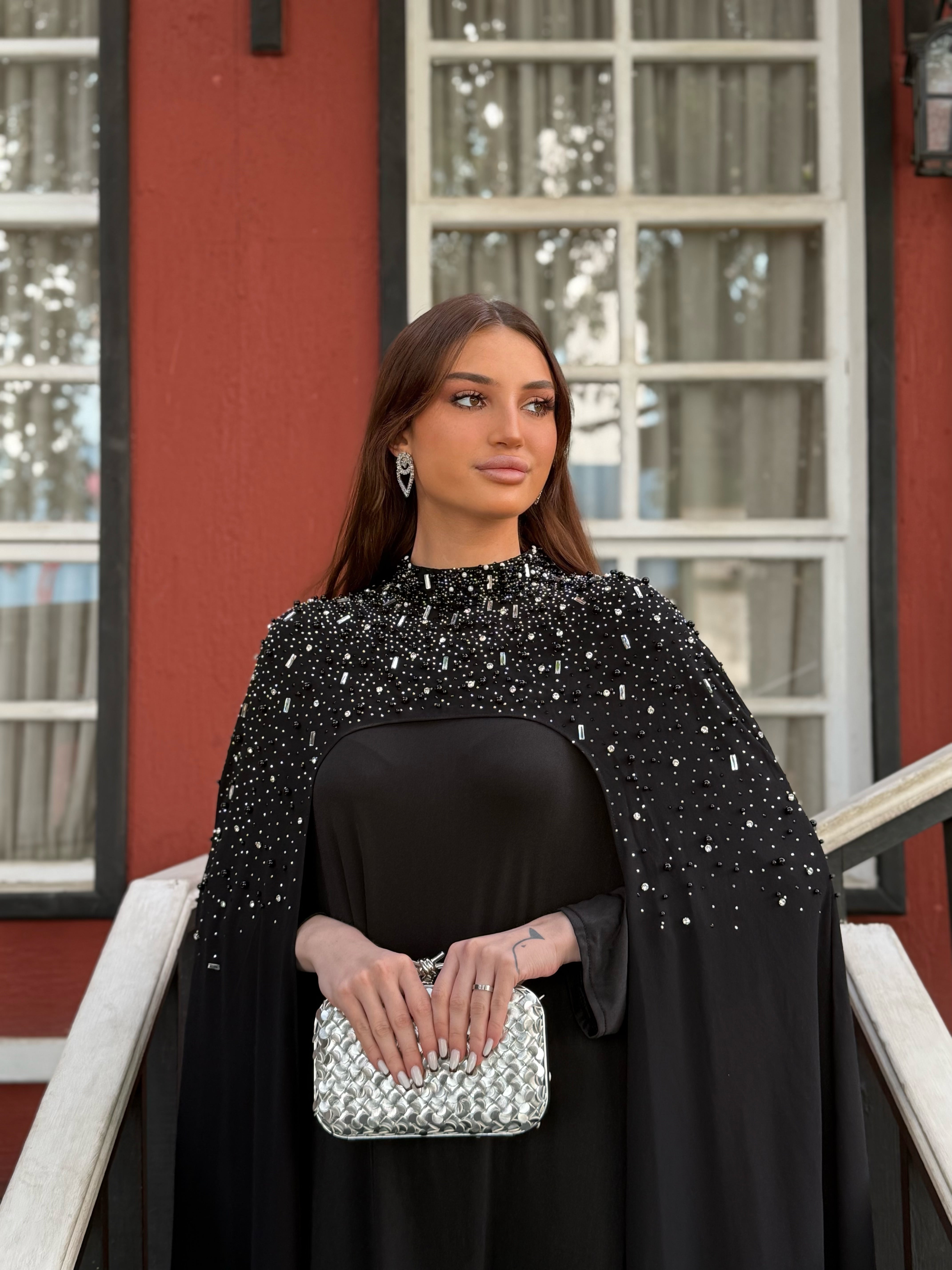 Midnight Sunburst Cape Gown